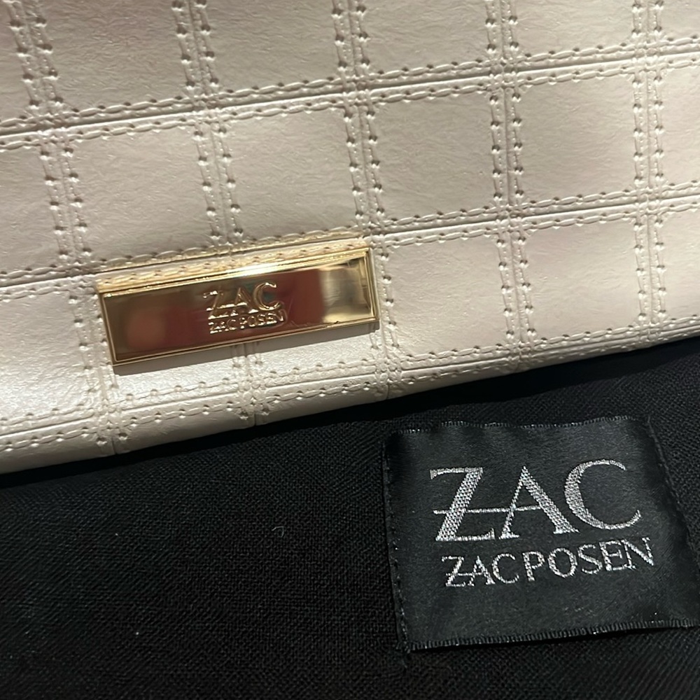 ZAC Posen metallic pearl satchel with cross body strap.